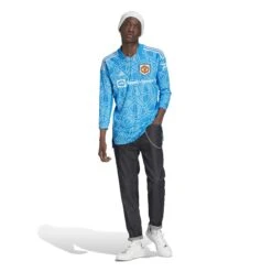 ADIDAS Maillot De Gardien Domicile Manchester United 2022/23 -Sport Vêtements Magasin adidas h64059 7 apparel on model walking view white xo